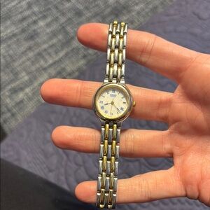 Seiko Gold and Silver Watch with Blue Markers